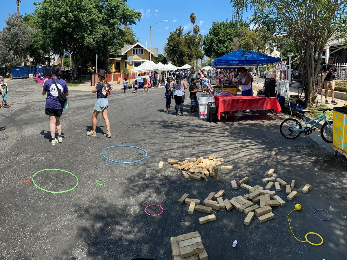 Picture of people enjoying the closed street for the Play Streets event