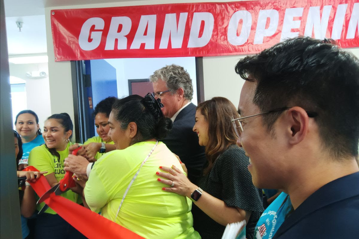 ribbon  cutting photo for grand opening